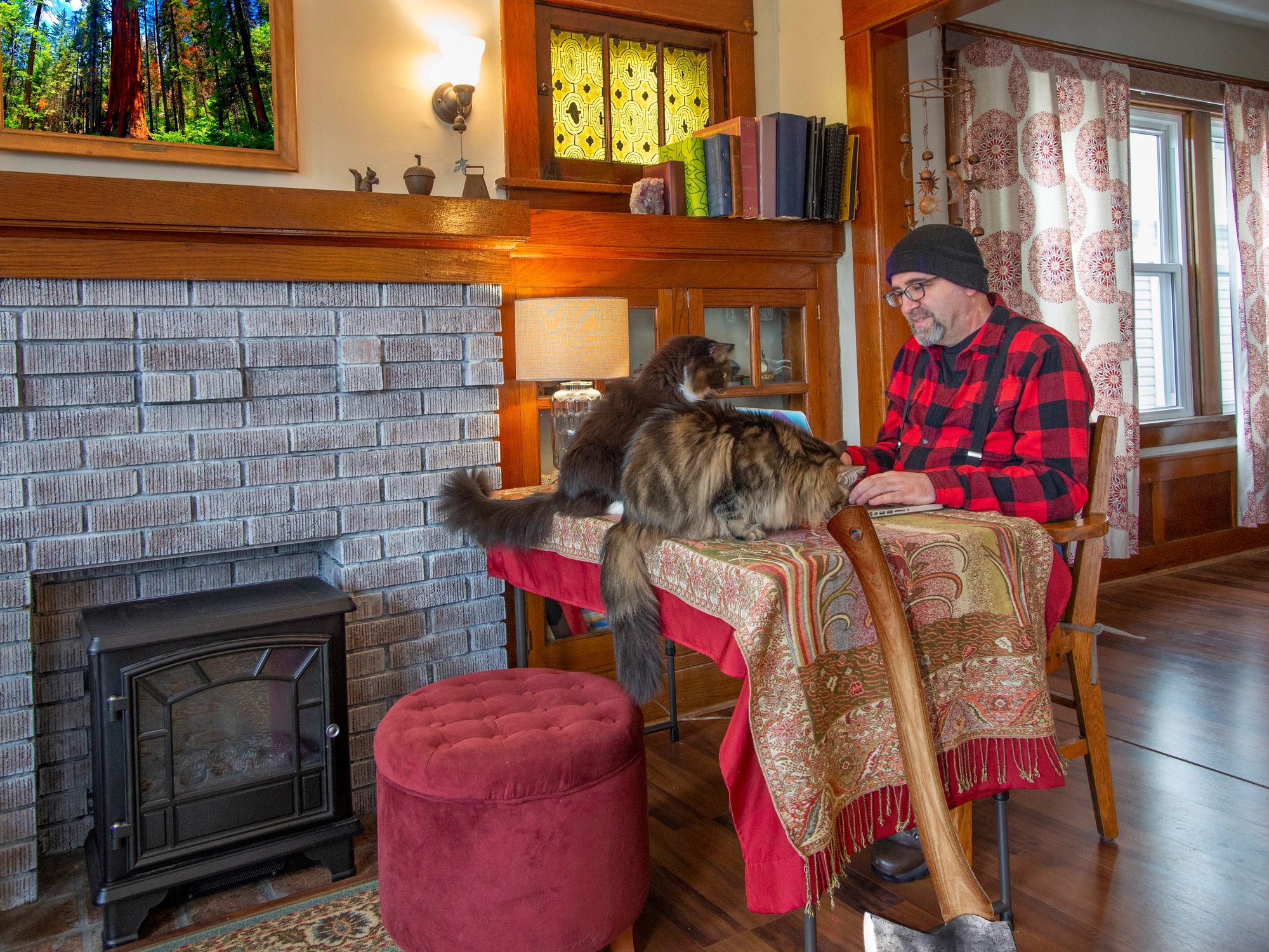 Worker near a fireplace in a residential setting