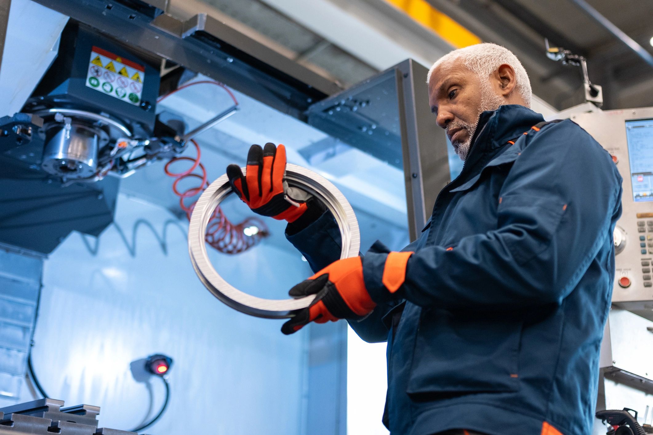 Commercial technician inspecting mechanical systems