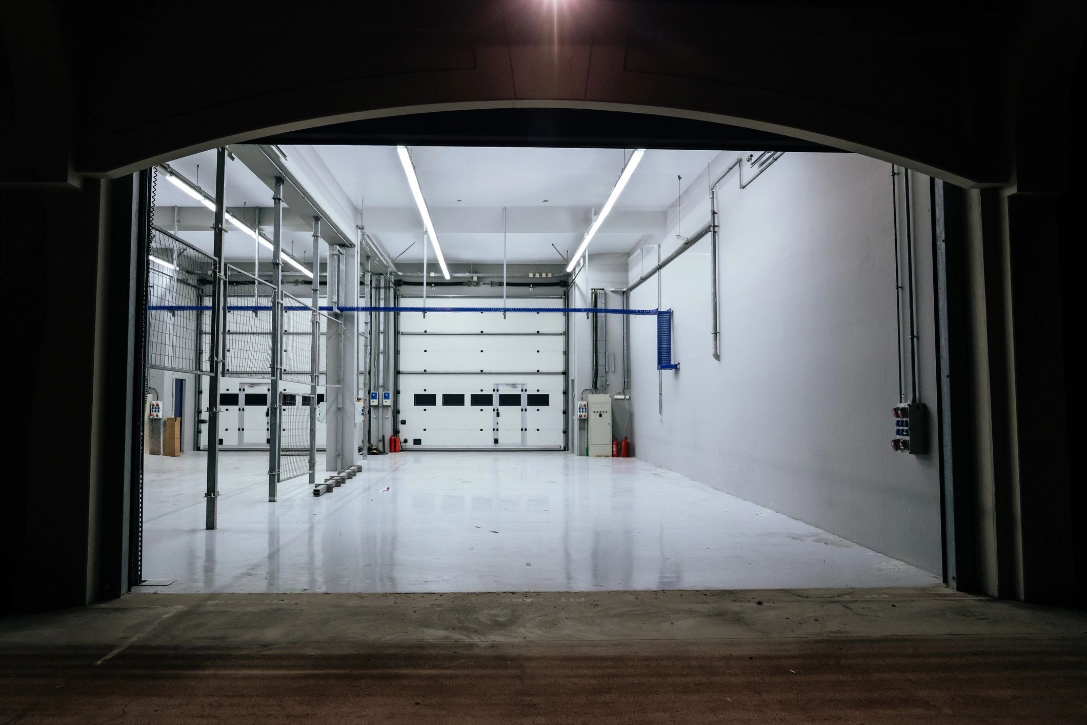 Large clean commercial interior representing shared building service areas